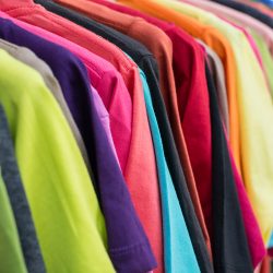 Row of Color T-SHIRT Hanging on Clothes Hanger